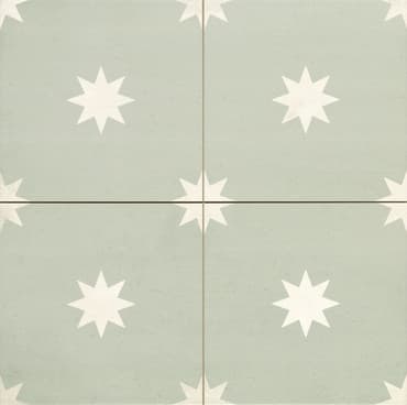 Carreau de ciment vert pâle avec motifs étoilés en relief blancs, taille 45x45 cm