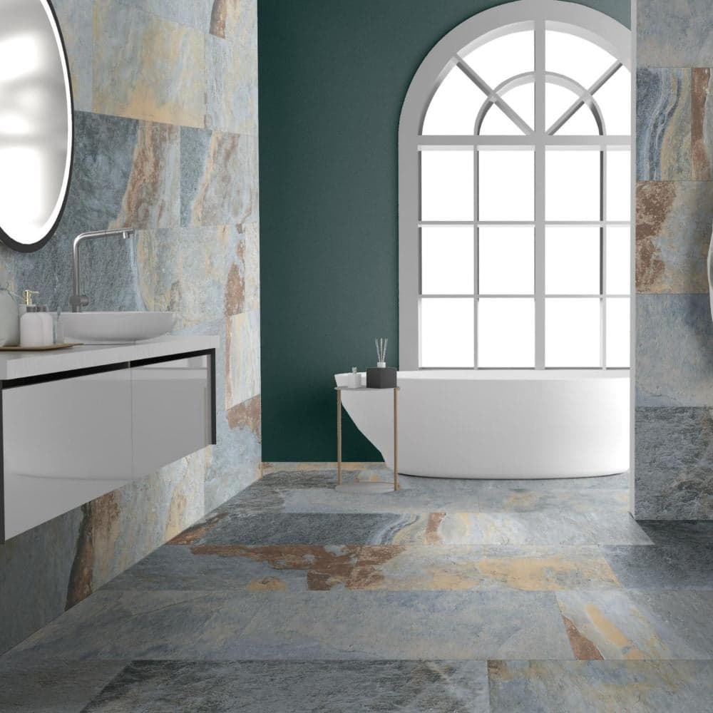 Carrelage en pierre multicouleur nuances de bleu gris beige 30x60 cm dans une salle de bain tons verts avec meuble vasque blanc et accessoires déco