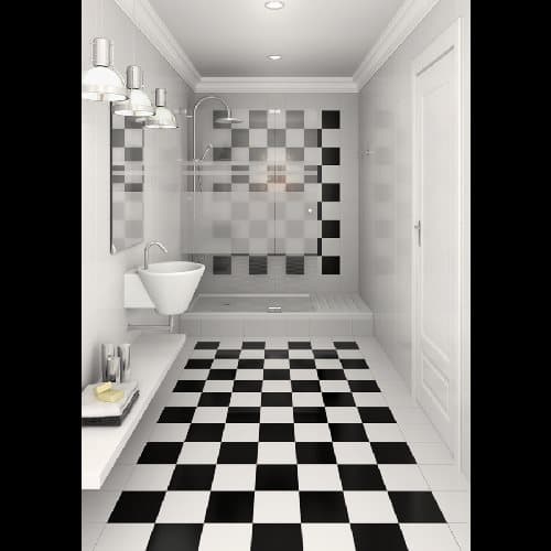 Carrelage uni noir et blanc sans motifs dans une salle de bain moderne avec murs gris, meubles blancs et des accents chromés