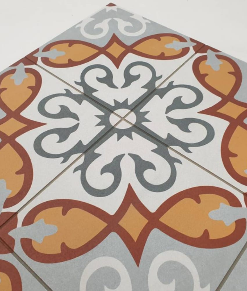 Carreau de ciment multicouleur avec motifs floraux et géométriques en marron, orange et gris, taille 60x60 cm