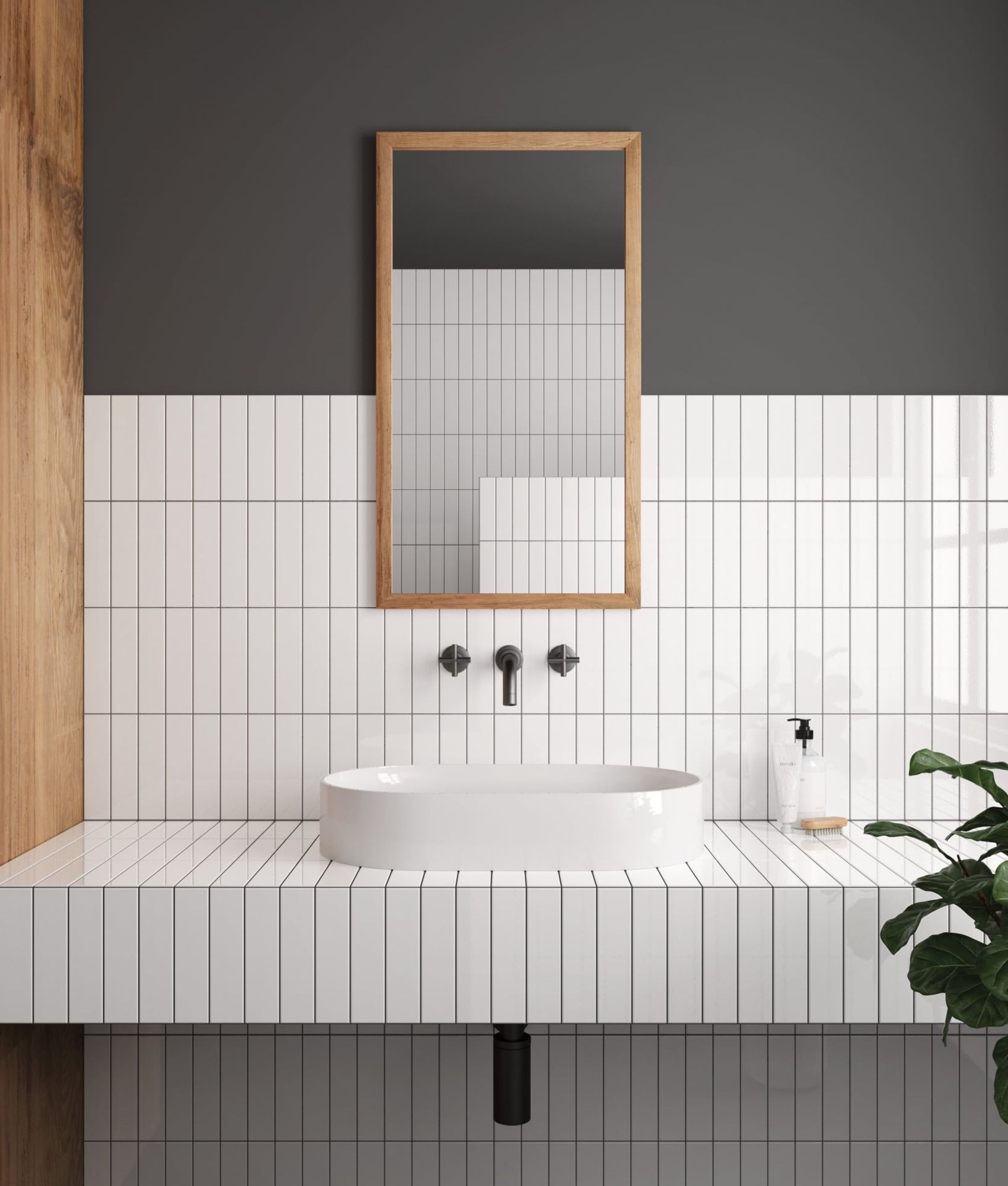 Carrelage uni blanc dans une salle de bain épurée avec murs gris, lavabo moderne, miroir en bois et plante verte