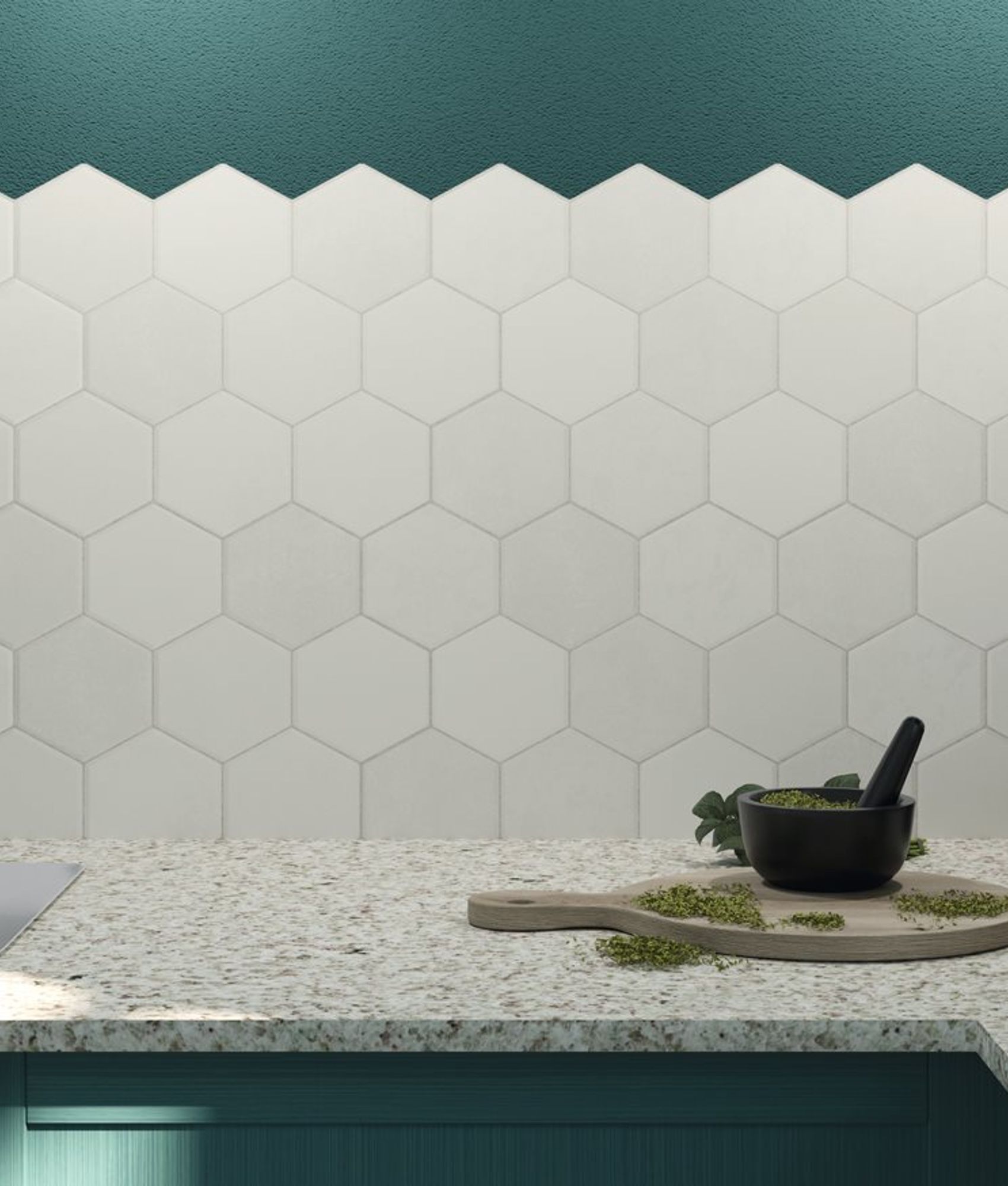 Carrelage uni blanc dans une cuisine moderne avec comptoir en granit, accessoires de cuisine en inox et plantes sur le rebord de